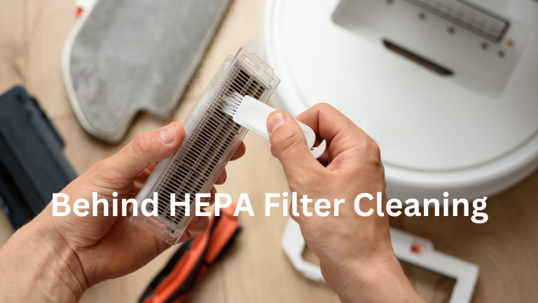 Woman's hand cleaning a used HEPA filter with water